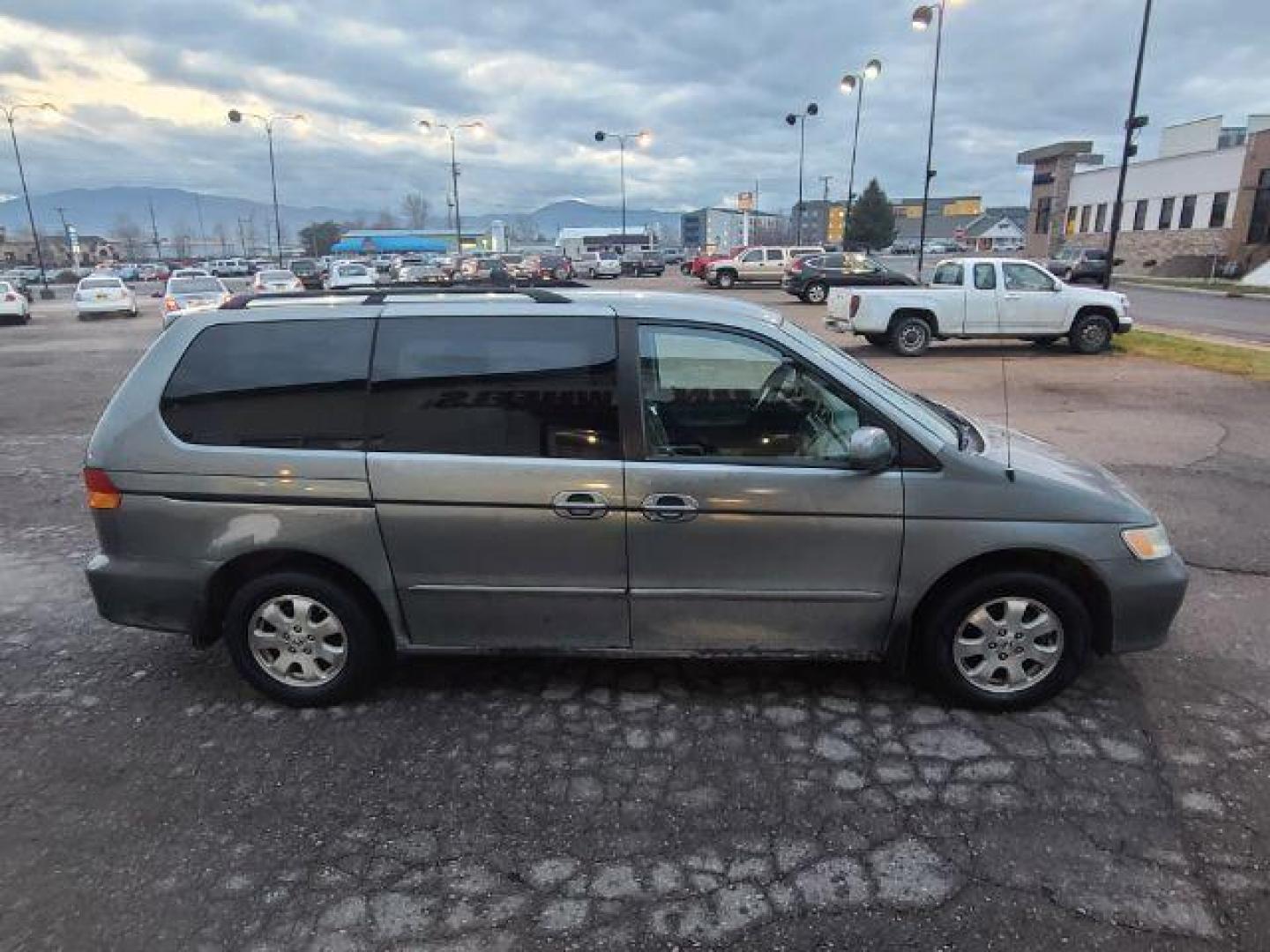 2002 Honda Odyssey EX (2HKRL18642H) with an 3.5L V6 SOHC 24V engine, 5-Speed Automatic transmission, located at 1800 West Broadway, Missoula, 59808, (406) 543-1986, 46.881348, -114.023628 - Photo#2