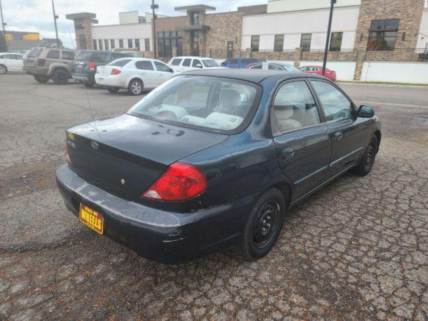 2003 Kia Spectra Base (KNAFB121935) with an 1.8L L4 DOHC 16V engine, located at 1800 West Broadway, Missoula, 59808, (406) 543-1986, 46.881348, -114.023628 - Photo#3