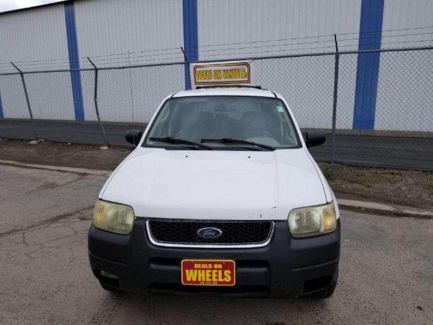 2004 Oxford White Ford Escape XLT 4WD (1FMYU93114D) with an 3.0L V6 DOHC 24V engine, 4-Speed Automatic transmission, located at 1821 N Montana Ave., Helena, MT, 59601, 0.000000, 0.000000 - Photo#1