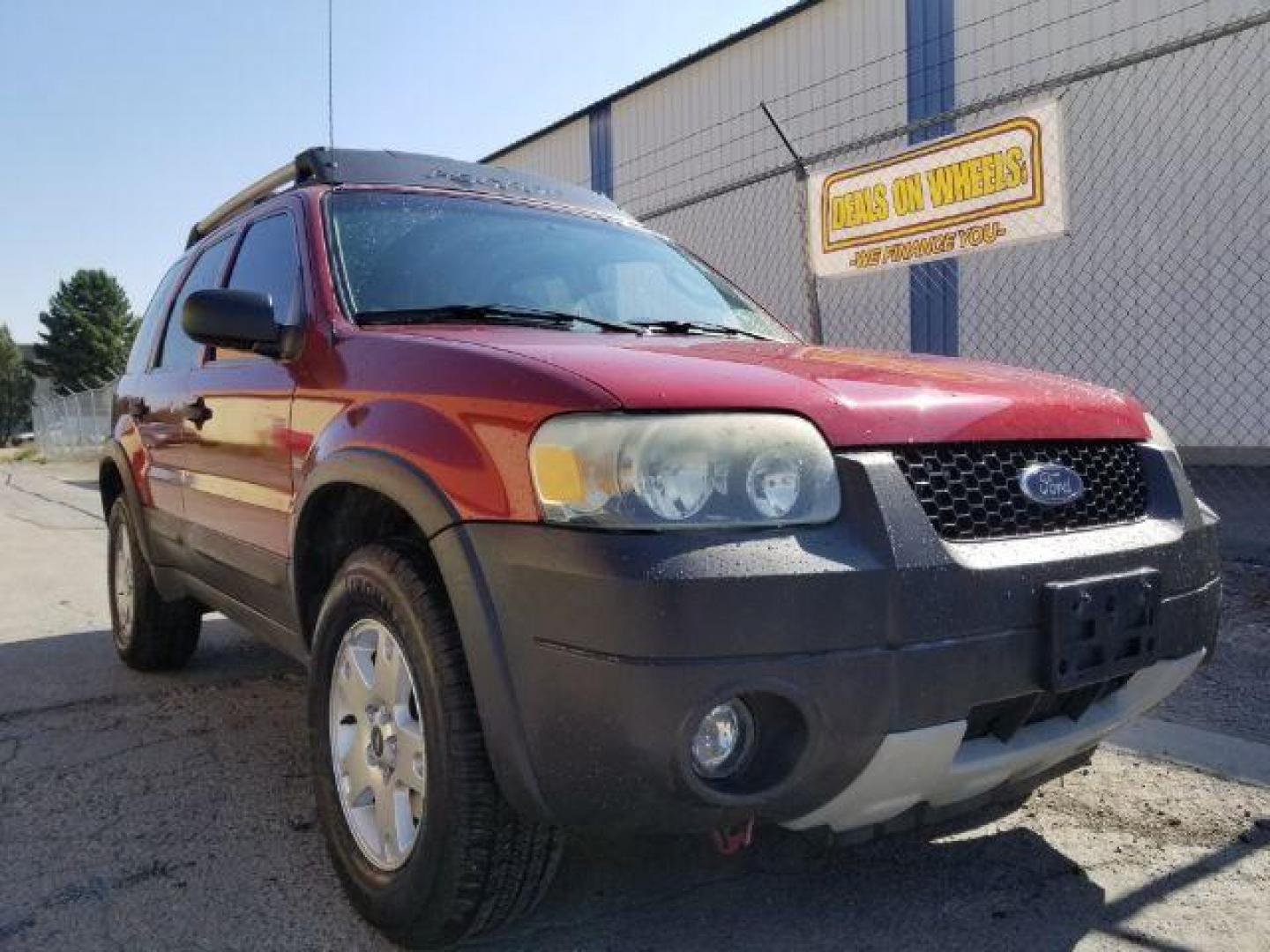 2005 Red Fire Metallic Ford Escape XLT 4WD (1FMYU93125K) with an 3.0L V6 DOHC 24V engine, 4-Speed Automatic transmission, located at 4801 10th Ave S,, Great Falls, MT, 59405, 0.000000, 0.000000 - Photo#6