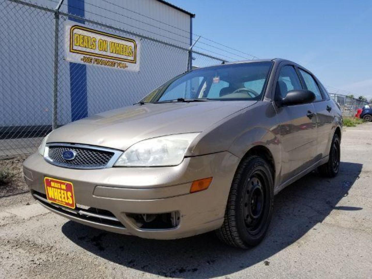 2005 Arizona Beige Metall Ford Focus ZX4 SE (1FAFP34N75W) with an 2.0L L4 DOHC 16V engine, located at 601 E. Idaho St., Kalispell, MT, 59901, (406) 300-4664, 0.000000, 0.000000 - Photo#0