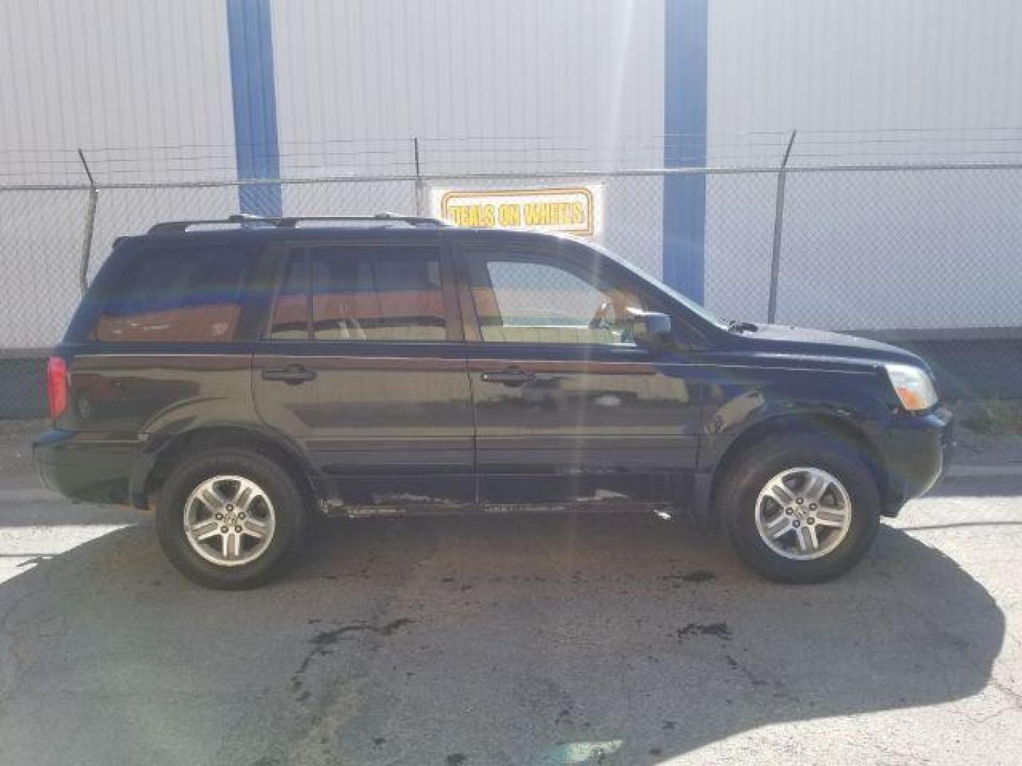 2005 Nighthawk Black Pearl Honda Pilot EX (2HKYF18425H) with an 3.5L V6 SOHC 24V engine, 5-Speed Automatic transmission, located at 1800 West Broadway, Missoula, 59808, (406) 543-1986, 46.881348, -114.023628 - Photo#5