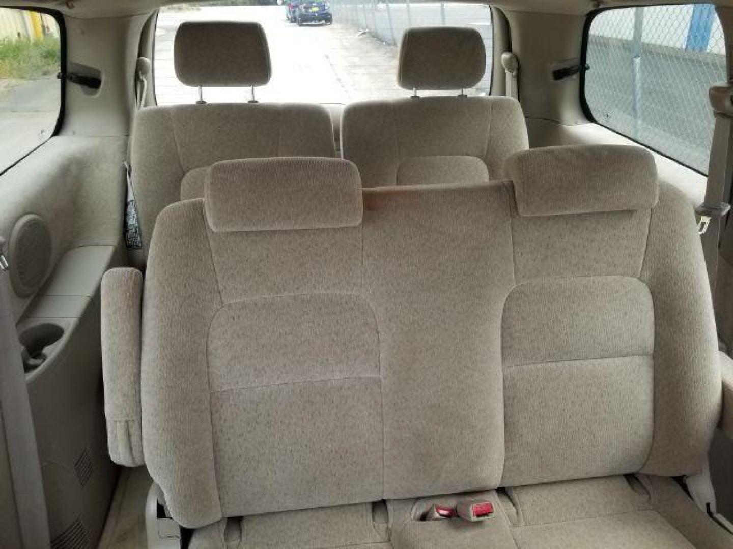 2005 Clear White /Beige Cloth Interior Kia Sedona LX (KNDUP132856) with an 3.5L V6 DOHC 16V engine, 5-Speed Automatic transmission, located at 4801 10th Ave S,, Great Falls, MT, 59405, 0.000000, 0.000000 - Photo#12