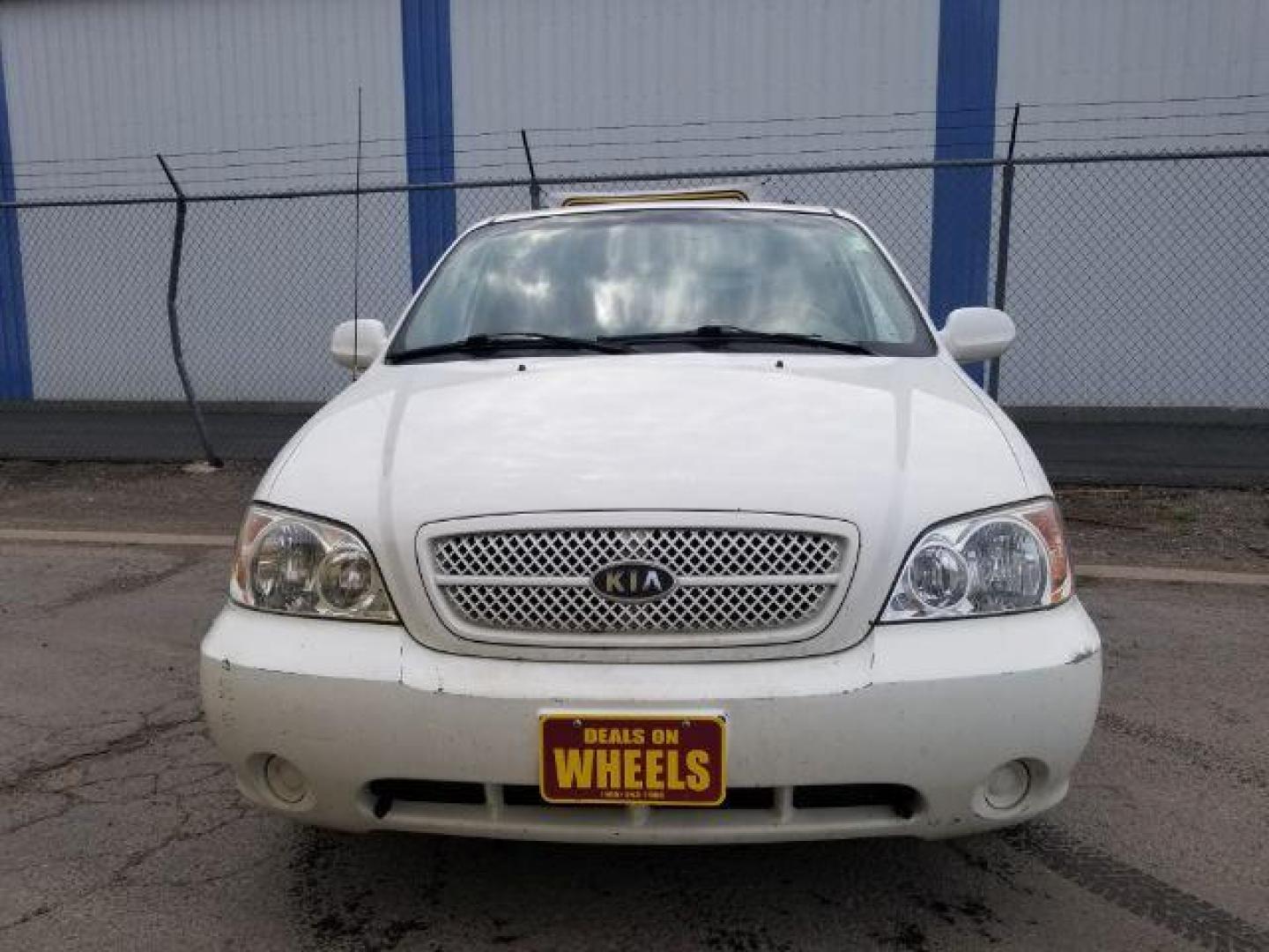 2005 Clear White /Beige Cloth Interior Kia Sedona LX (KNDUP132856) with an 3.5L V6 DOHC 16V engine, 5-Speed Automatic transmission, located at 4801 10th Ave S,, Great Falls, MT, 59405, 0.000000, 0.000000 - Photo#1