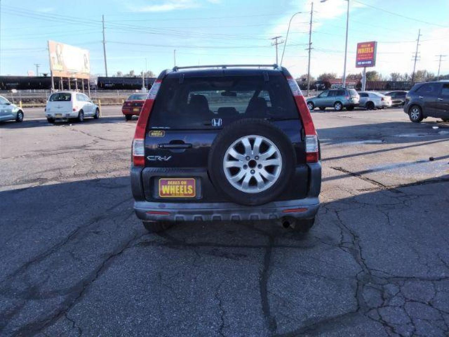 2006 Honda CR-V EX 4WD AT (JHLRD78806C) with an 2.4L L4 DOHC 16V engine, 5-Speed Automatic transmission, located at 4047 Montana Ave., Billings, MT, 59101, 45.770847, -108.529800 - Photo#6