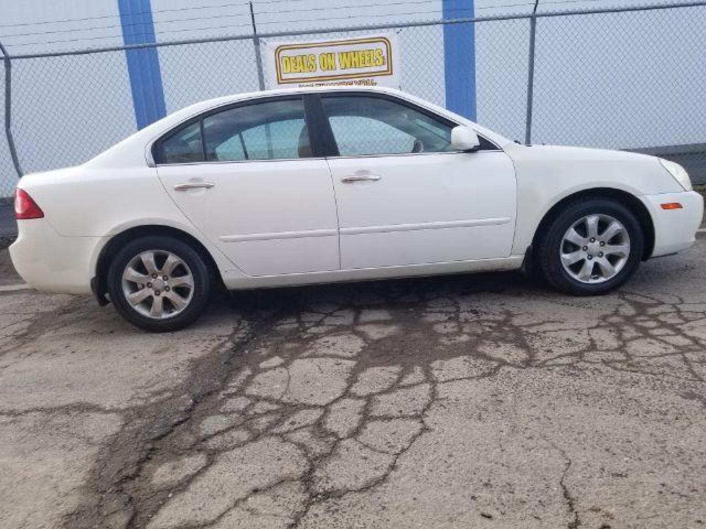 2006 Kia Optima EX V6 (KNAGE124965) with an 2.7L V6 24V DOHC engine, 4-Speed Automatic transmission, located at 601 E. Idaho St., Kalispell, MT, 59901, (406) 300-4664, 0.000000, 0.000000 - Photo#3