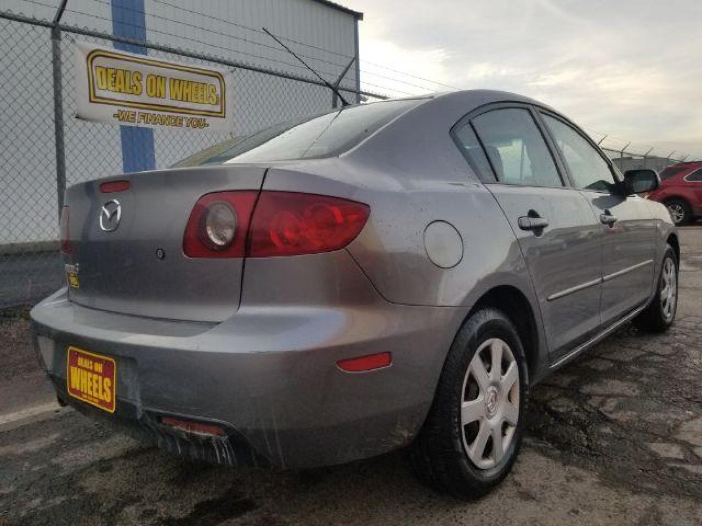 2006 Mazda MAZDA3 i 4-door (JM1BK12FX61) with an 2.0L L4 DOHC 16V engine, located at 4047 Montana Ave., Billings, MT, 59101, 45.770847, -108.529800 - Photo#4