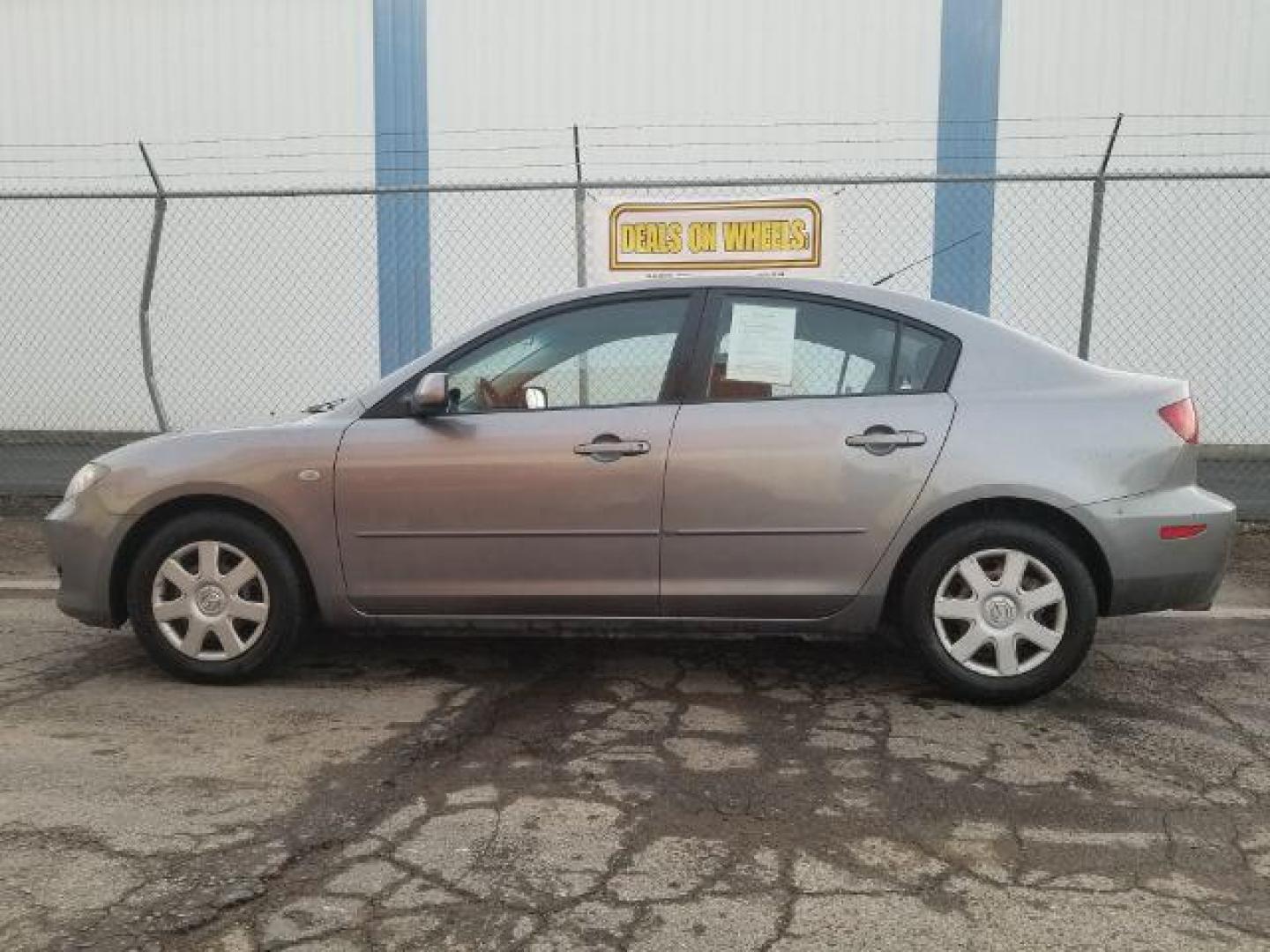 2006 Mazda MAZDA3 i 4-door (JM1BK12FX61) with an 2.0L L4 DOHC 16V engine, located at 4047 Montana Ave., Billings, MT, 59101, 45.770847, -108.529800 - Photo#6