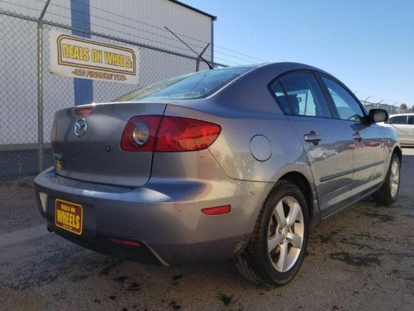 2006 Mazda MAZDA3 i 4-door (JM1BK12FX61) with an 2.0L L4 DOHC 16V engine, located at 601 E. Idaho St., Kalispell, MT, 59901, (406) 300-4664, 0.000000, 0.000000 - Photo#4