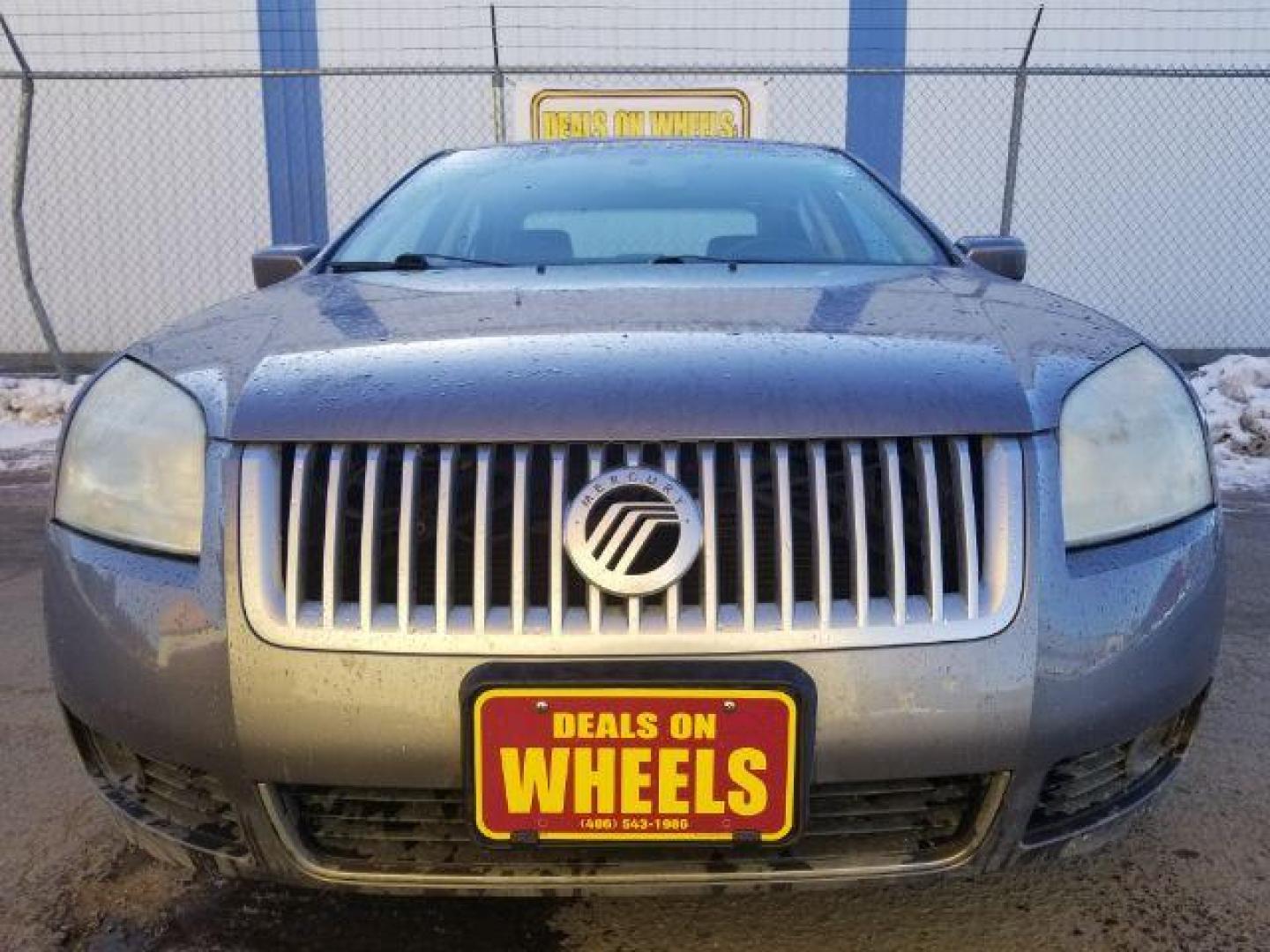 2006 Mercury Milan V6 Premier (3MEHM08196R) with an 3.0L V6 DOHC 24V engine, 6-Speed Automatic transmission, located at 4047 Montana Ave., Billings, MT, 59101, 45.770847, -108.529800 - Photo#1