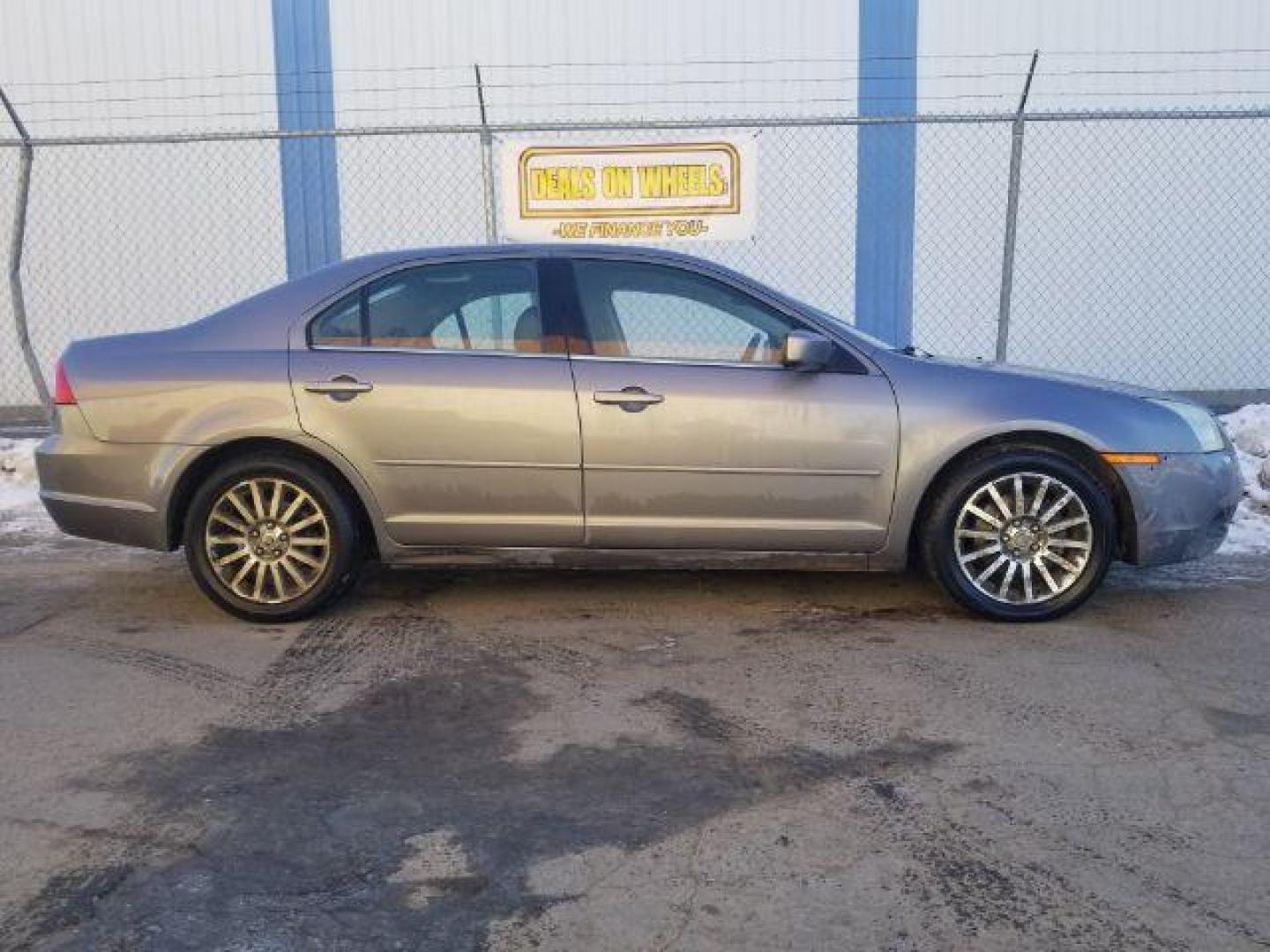 2006 Mercury Milan V6 Premier (3MEHM08196R) with an 3.0L V6 DOHC 24V engine, 6-Speed Automatic transmission, located at 4047 Montana Ave., Billings, MT, 59101, 45.770847, -108.529800 - Photo#3