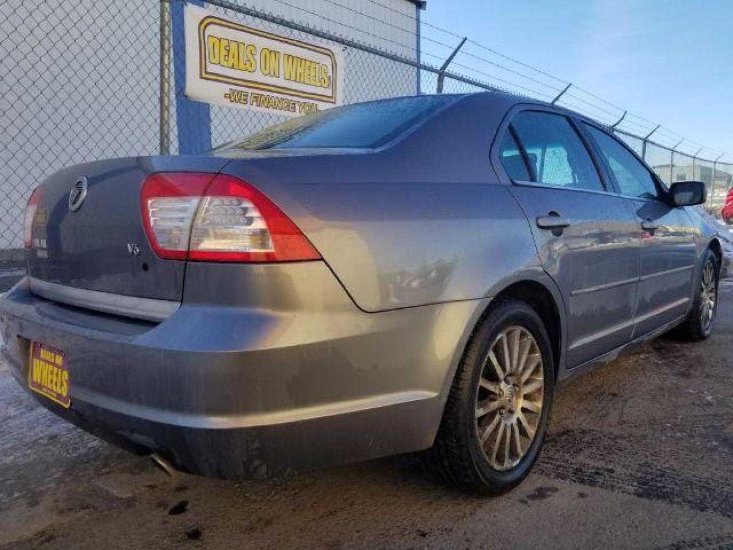 2006 Mercury Milan V6 Premier (3MEHM08196R) with an 3.0L V6 DOHC 24V engine, 6-Speed Automatic transmission, located at 4047 Montana Ave., Billings, MT, 59101, 45.770847, -108.529800 - Photo#4