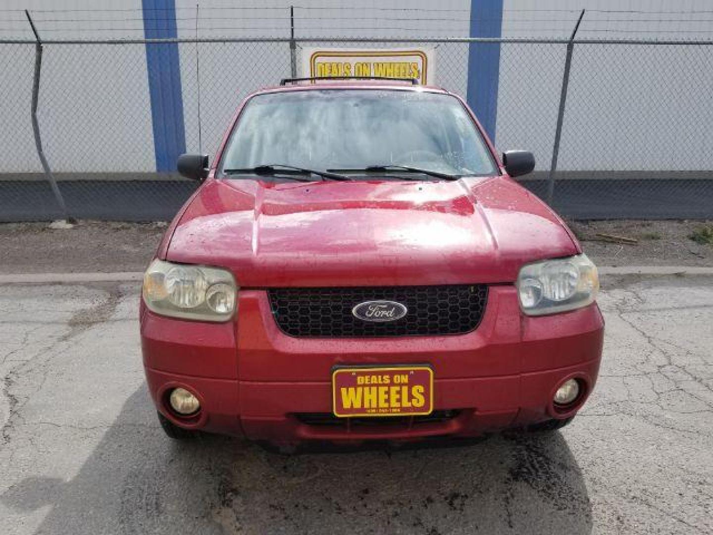 2007 Red Fire Metallic Ford Escape Limited 4WD (1FMYU94127K) with an 3.0L V6 DOHC 24V engine, 4-Speed Automatic transmission, located at 4801 10th Ave S,, Great Falls, MT, 59405, 0.000000, 0.000000 - Photo#1