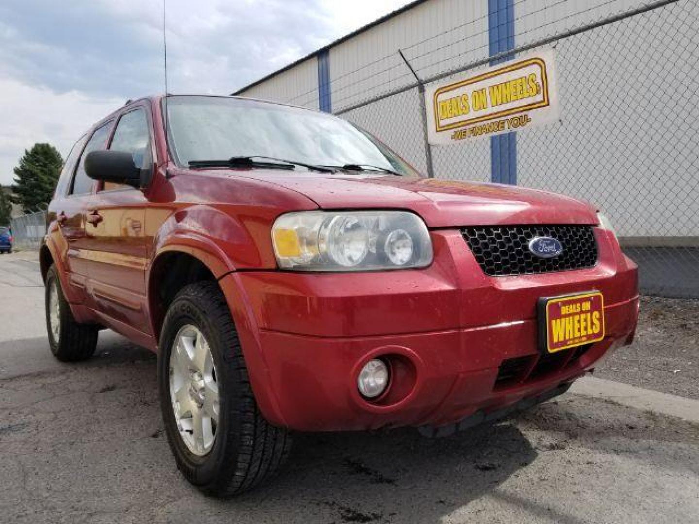 2007 Red Fire Metallic Ford Escape Limited 4WD (1FMYU94127K) with an 3.0L V6 DOHC 24V engine, 4-Speed Automatic transmission, located at 4801 10th Ave S,, Great Falls, MT, 59405, 0.000000, 0.000000 - Photo#6