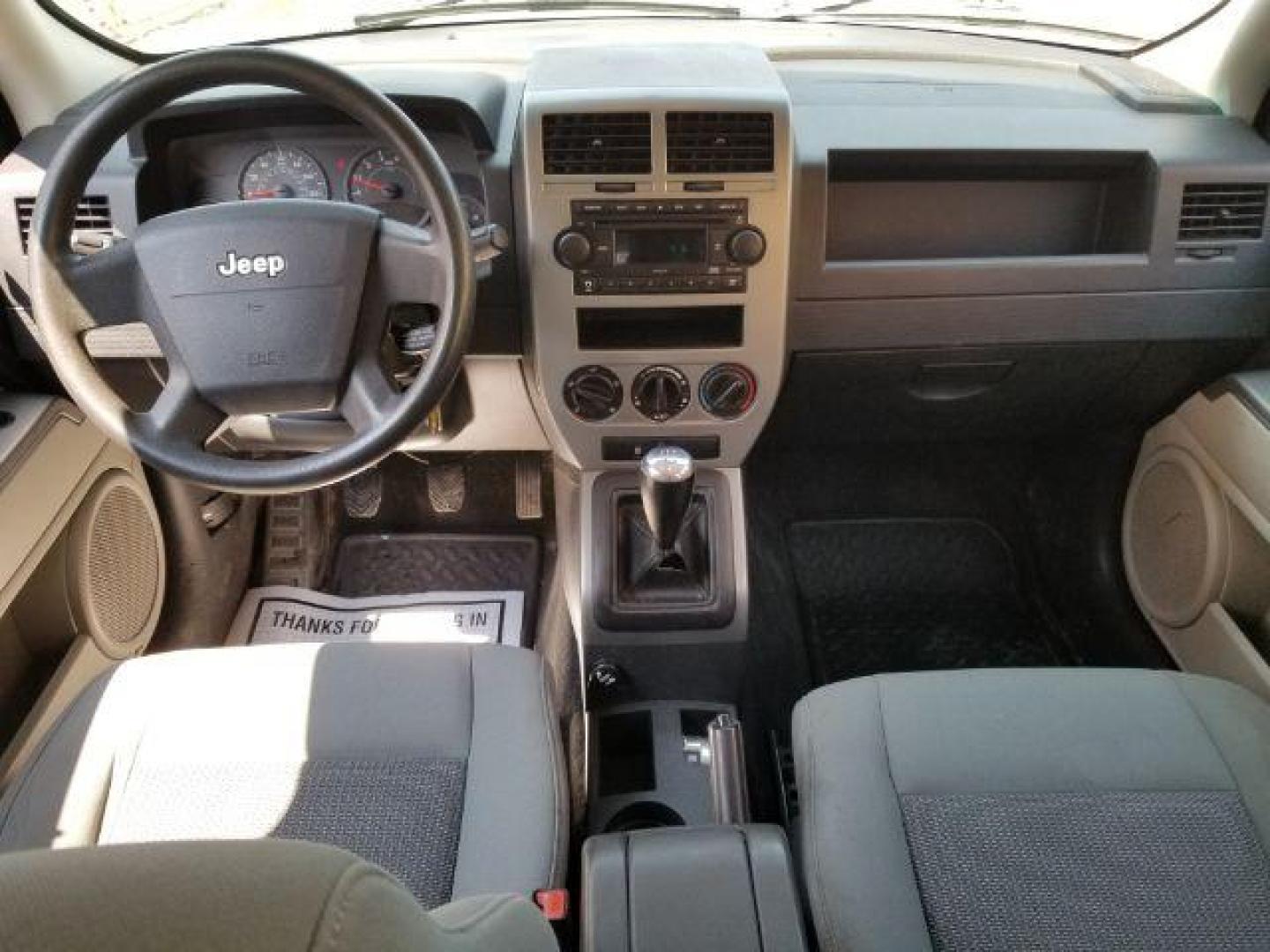 2007 Jeep Patriot Sport 4WD (1J8FF28W77D) with an 2.4L L4 DOHC 16V engine, 5-Speed Manual transmission, located at 4047 Montana Ave., Billings, MT, 59101, 45.770847, -108.529800 - Photo#11