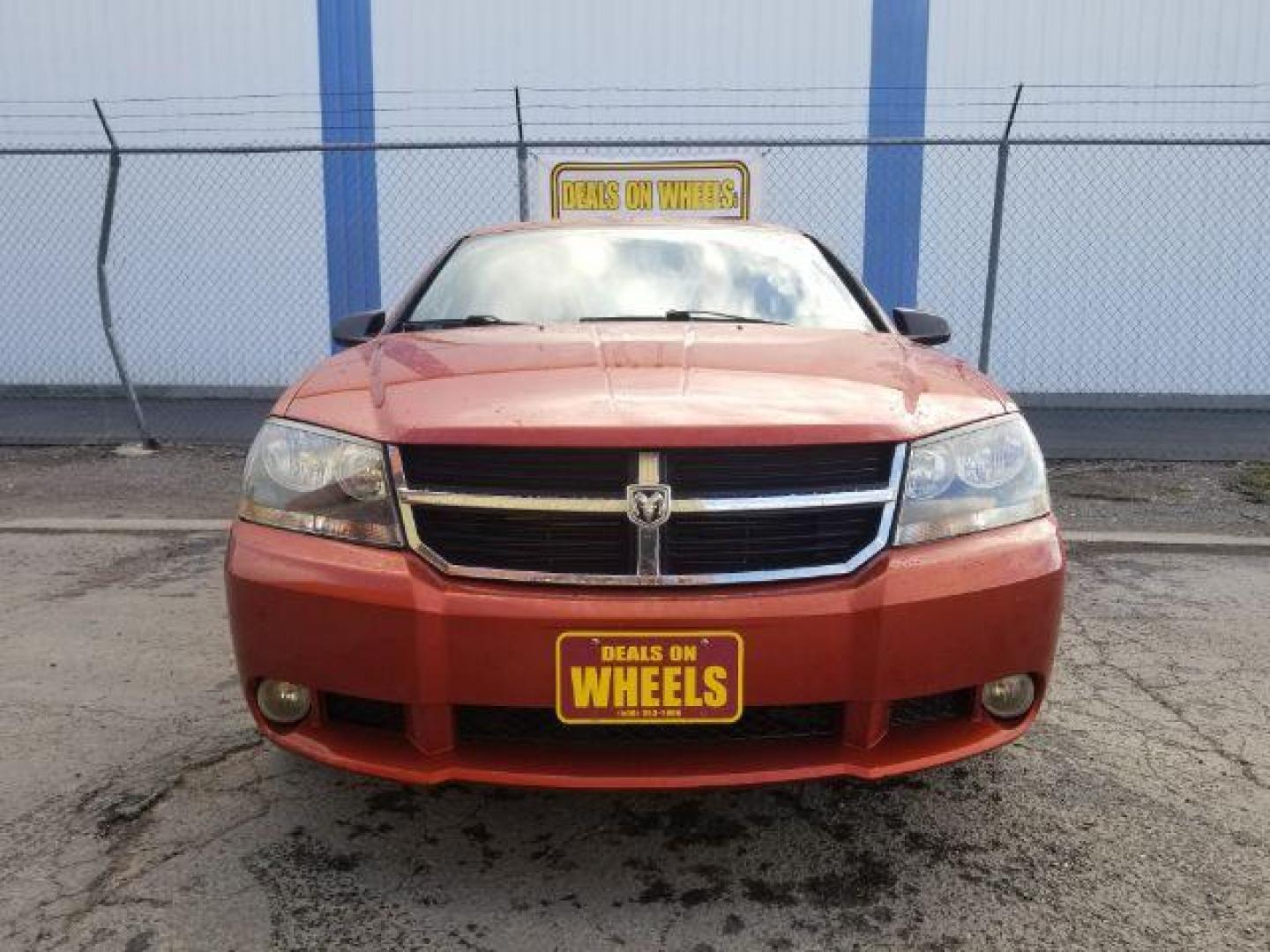 2008 Sunburst Orange Pear Dodge Avenger SXT (1B3LC56R08N) with an 2.7L V6 DOHC 24V FFV engine, 4-Speed Automatic transmission, located at 1800 West Broadway, Missoula, 59808, (406) 543-1986, 46.881348, -114.023628 - Photo#1