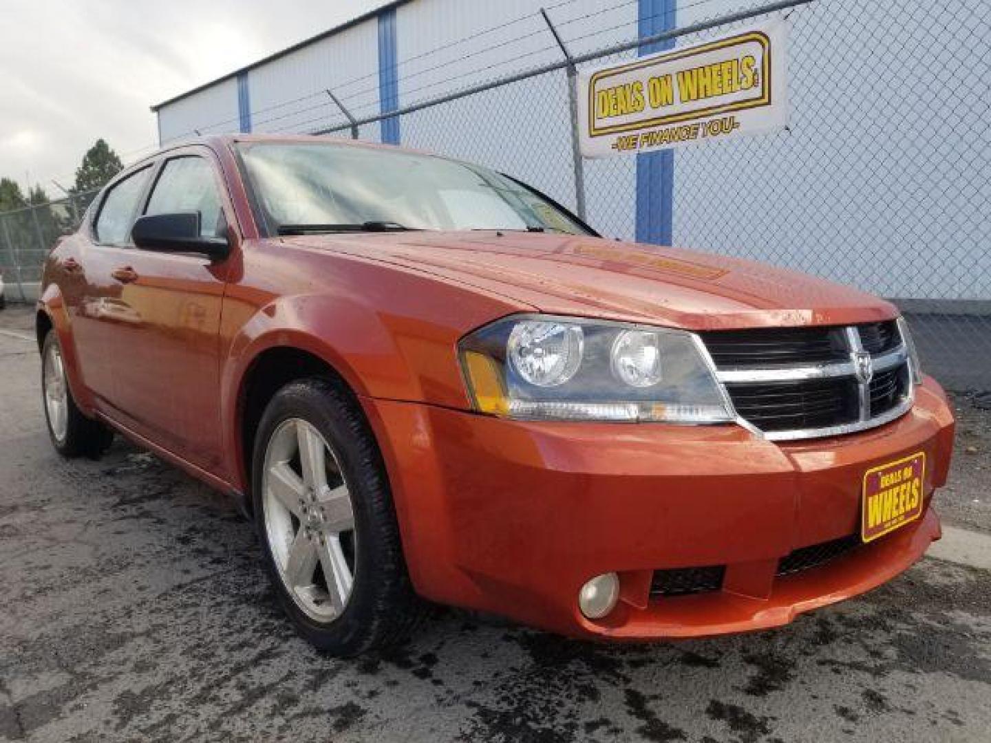 2008 Sunburst Orange Pear Dodge Avenger SXT (1B3LC56R08N) with an 2.7L V6 DOHC 24V FFV engine, 4-Speed Automatic transmission, located at 1800 West Broadway, Missoula, 59808, (406) 543-1986, 46.881348, -114.023628 - Photo#2