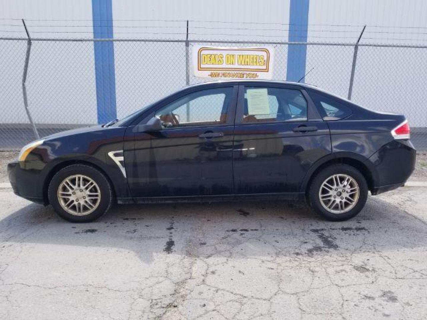 2008 Ford Focus SE Sedan (1FAHP35N28W) with an 2.0L L4 DOHC 16V engine, located at 1800 West Broadway, Missoula, 59808, (406) 543-1986, 46.881348, -114.023628 - Photo#2