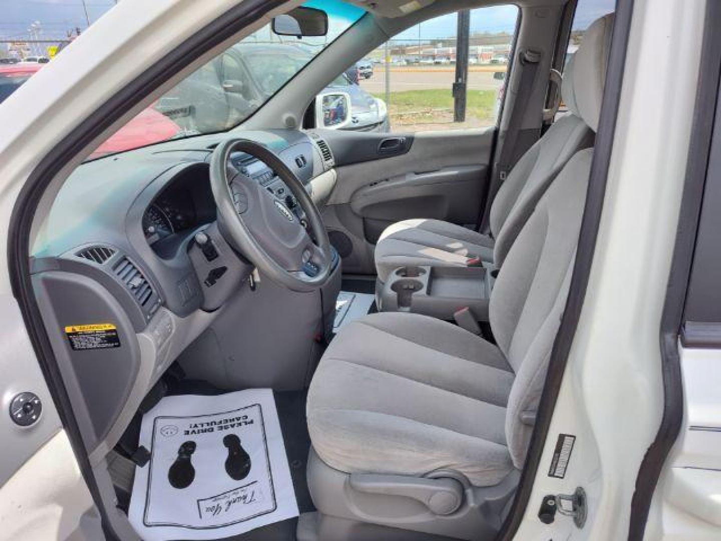 2008 Clear White Kia Sedona LX LWB (KNDMB233686) with an 3.8L V6 DOHC 24V engine, 5-Speed Automatic transmission, located at 4801 10th Ave S,, Great Falls, MT, 59405, 0.000000, 0.000000 - Photo#8