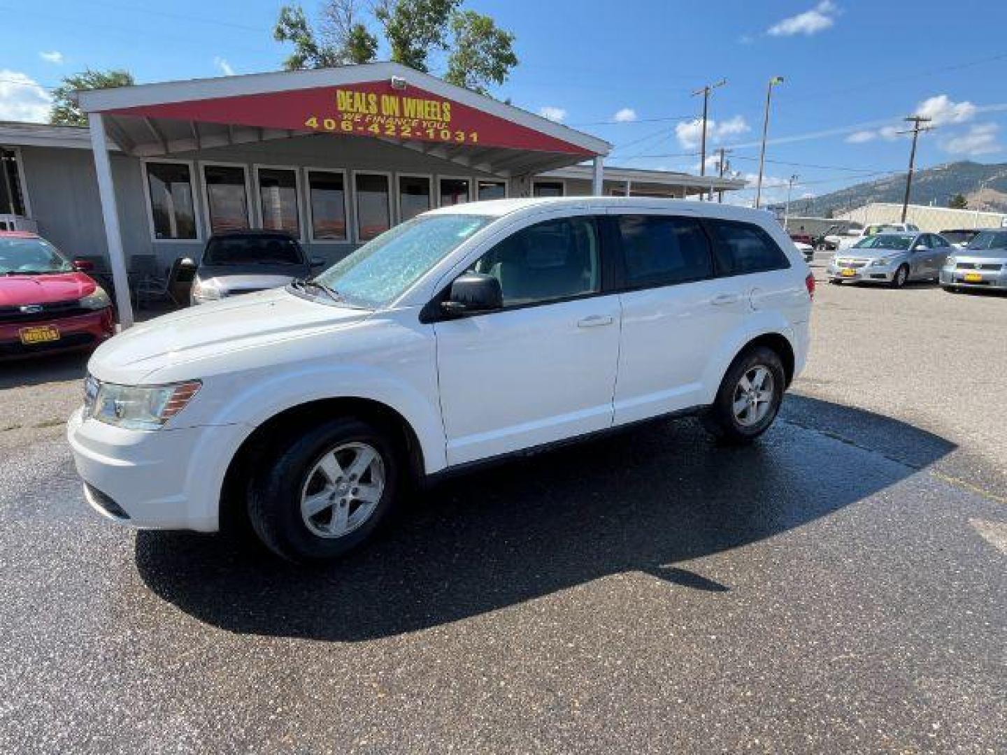 2009 Dodge Journey SE (3D4GG47B19T) with an 2.4L L4 DOHC 16V engine, 4-Speed Automatic transmission, located at 1821 N Montana Ave., Helena, MT, 59601, 0.000000, 0.000000 - Photo#0