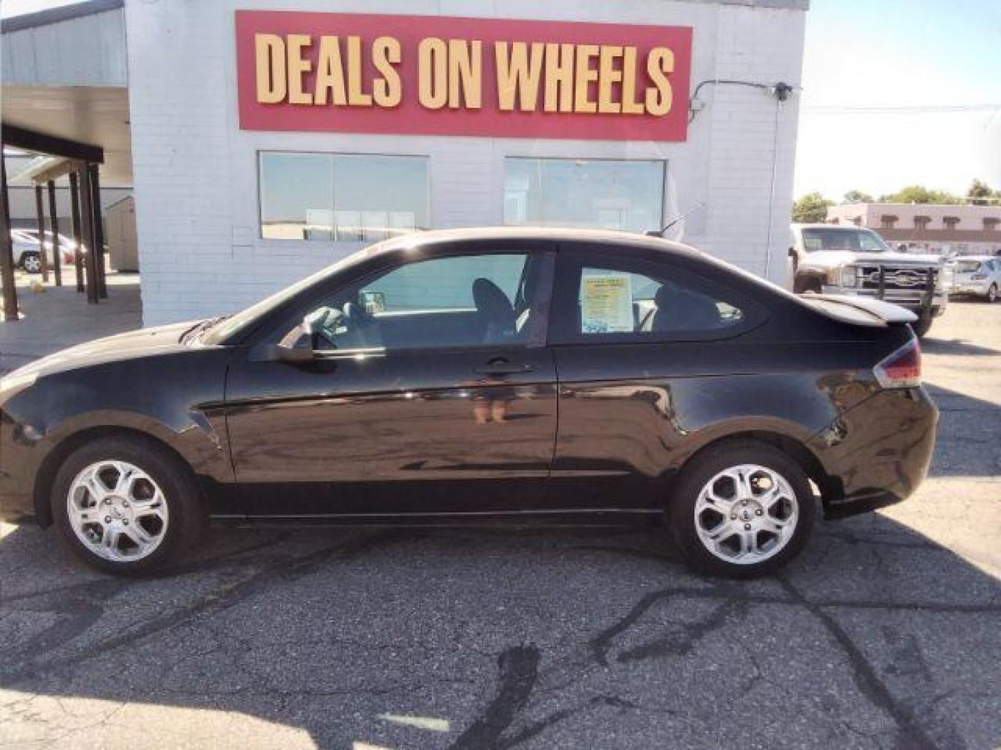 2009 Ford Focus SE Coupe (1FAHP32N69W) with an 2.0L L4 DOHC 16V engine, located at 4801 10th Ave S,, Great Falls, MT, 59405, 0.000000, 0.000000 - Photo#1