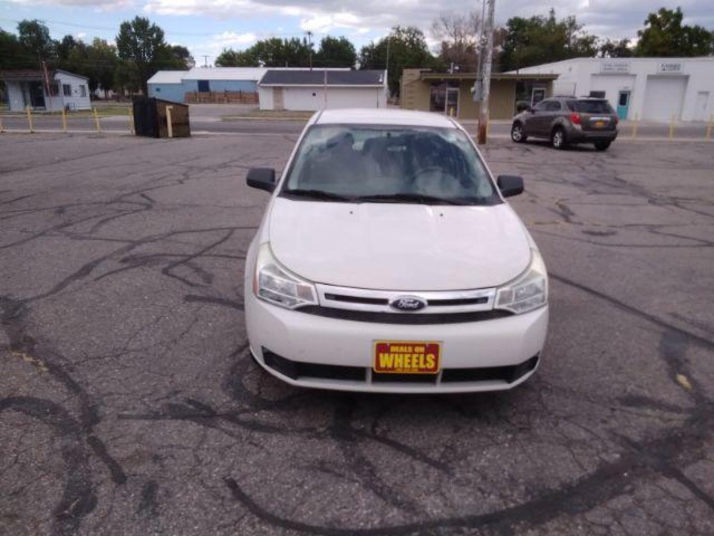 2009 Ford Focus SE Sedan (1FAHP35N29W) with an 2.0L L4 DOHC 16V engine, located at 4047 Montana Ave., Billings, MT, 59101, 45.770847, -108.529800 - Photo#1