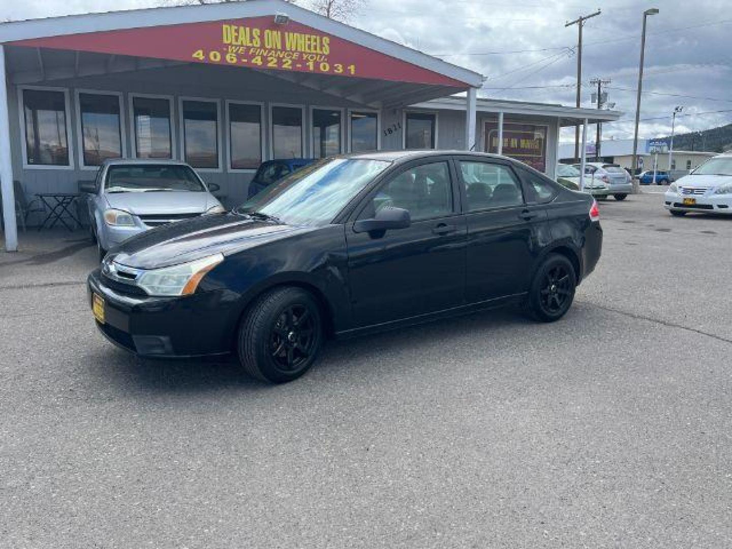 2009 Ford Focus SE Sedan (1FAHP35N99W) with an 2.0L L4 DOHC 16V engine, located at 1821 N Montana Ave., Helena, MT, 59601, 0.000000, 0.000000 - Photo#0