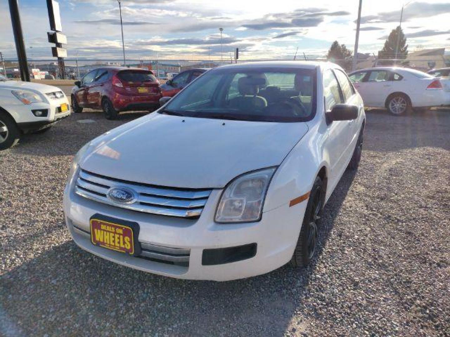 2009 Ford Fusion I4 S (3FAHP06Z19R) with an 2.3L L4 DOHC 16V engine, located at 4801 10th Ave S,, Great Falls, MT, 59405, 0.000000, 0.000000 - Photo#0