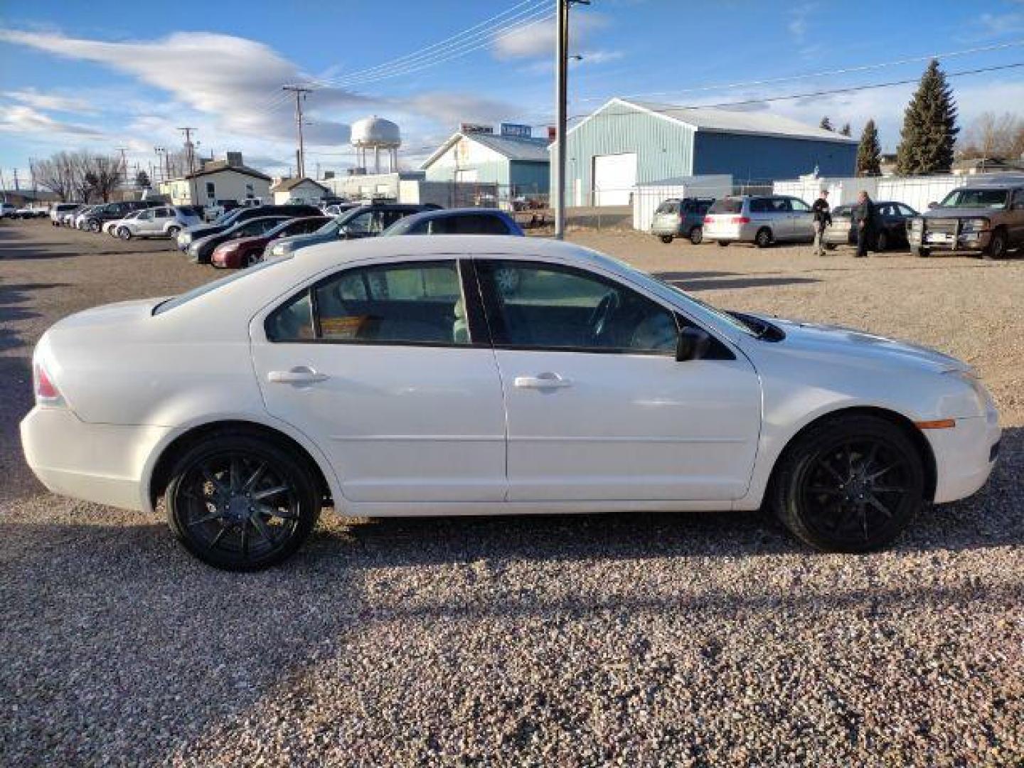 2009 Ford Fusion I4 S (3FAHP06Z19R) with an 2.3L L4 DOHC 16V engine, located at 4801 10th Ave S,, Great Falls, MT, 59405, 0.000000, 0.000000 - Photo#5