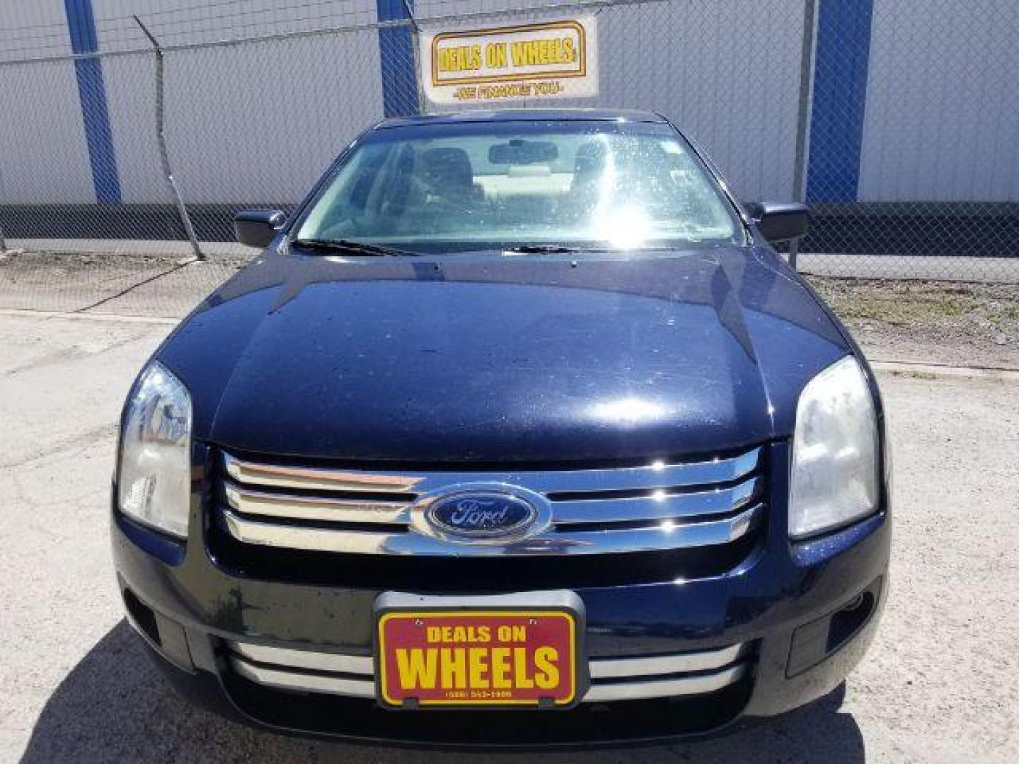 2009 Ford Fusion I4 SE (3FAHP07Z89R) with an 2.3L L4 DOHC 16V engine, located at 4801 10th Ave S,, Great Falls, MT, 59405, 0.000000, 0.000000 - Photo#1