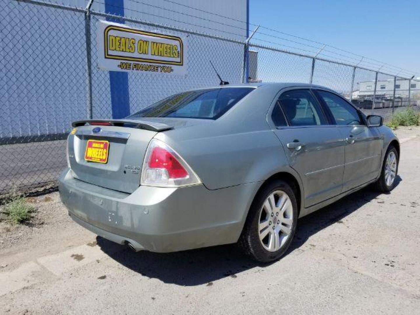 2009 Ford Fusion V6 SEL AWD (3FAHP02119R) with an 3.0L V6 DOHC 24V engine, located at 601 E. Idaho St., Kalispell, MT, 59901, (406) 300-4664, 0.000000, 0.000000 - Photo#4