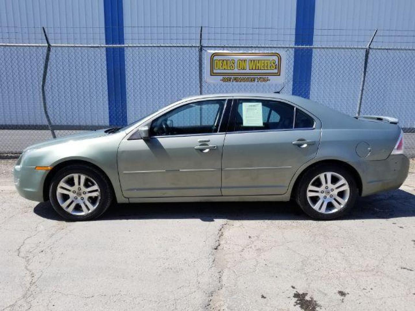 2009 Ford Fusion V6 SEL AWD (3FAHP02119R) with an 3.0L V6 DOHC 24V engine, located at 601 E. Idaho St., Kalispell, MT, 59901, (406) 300-4664, 0.000000, 0.000000 - Photo#2