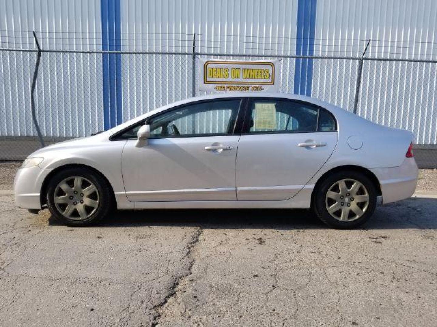 2009 Honda Civic LX Sedan 5-Speed AT (2HGFA16519H) with an 1.8L L4 SOHC 16V engine, 5-Speed Automatic transmission, located at 1800 West Broadway, Missoula, 59808, (406) 543-1986, 46.881348, -114.023628 - Photo#2