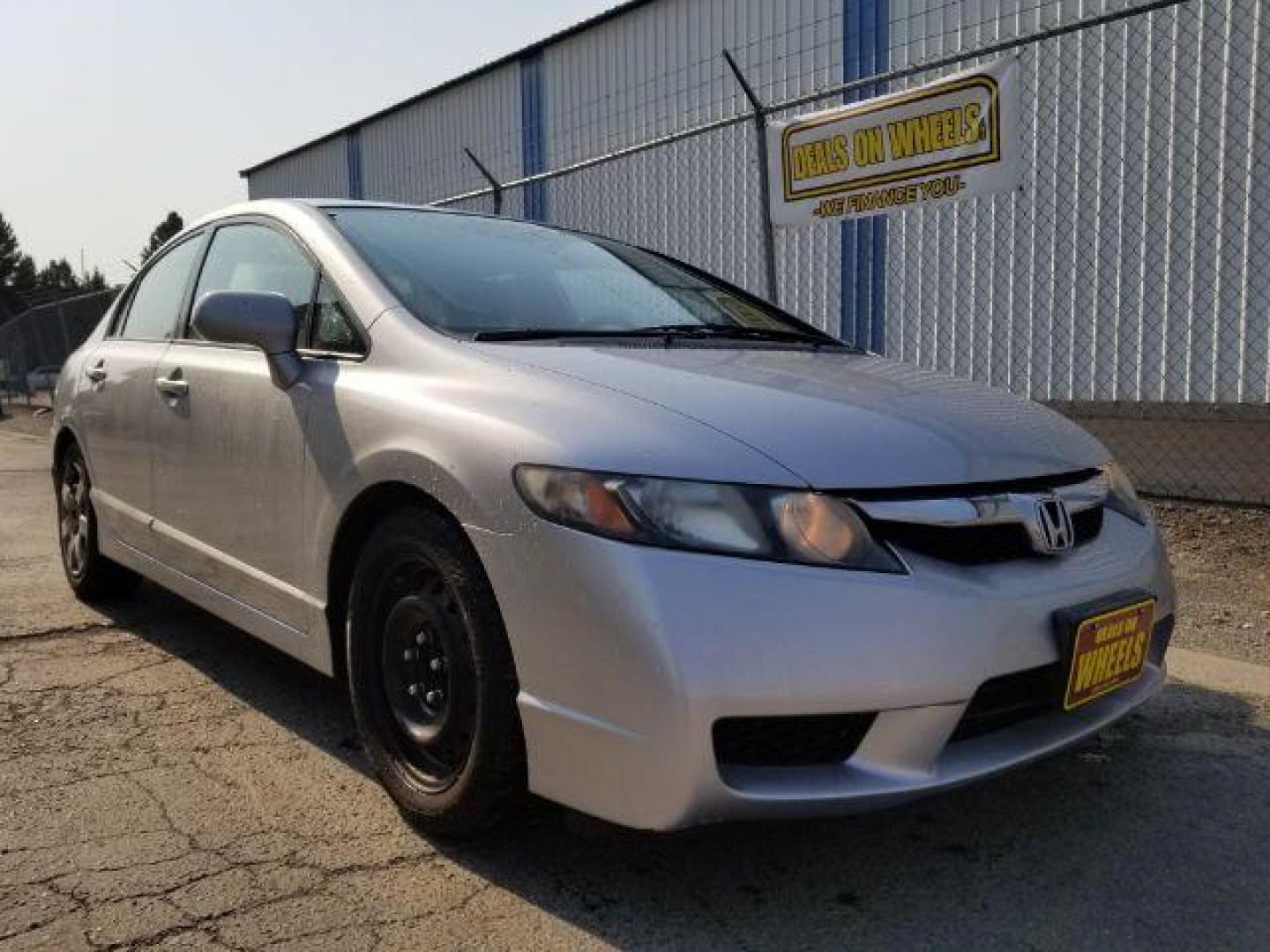 2009 Honda Civic LX Sedan 5-Speed AT (2HGFA16519H) with an 1.8L L4 SOHC 16V engine, 5-Speed Automatic transmission, located at 1800 West Broadway, Missoula, 59808, (406) 543-1986, 46.881348, -114.023628 - Photo#6