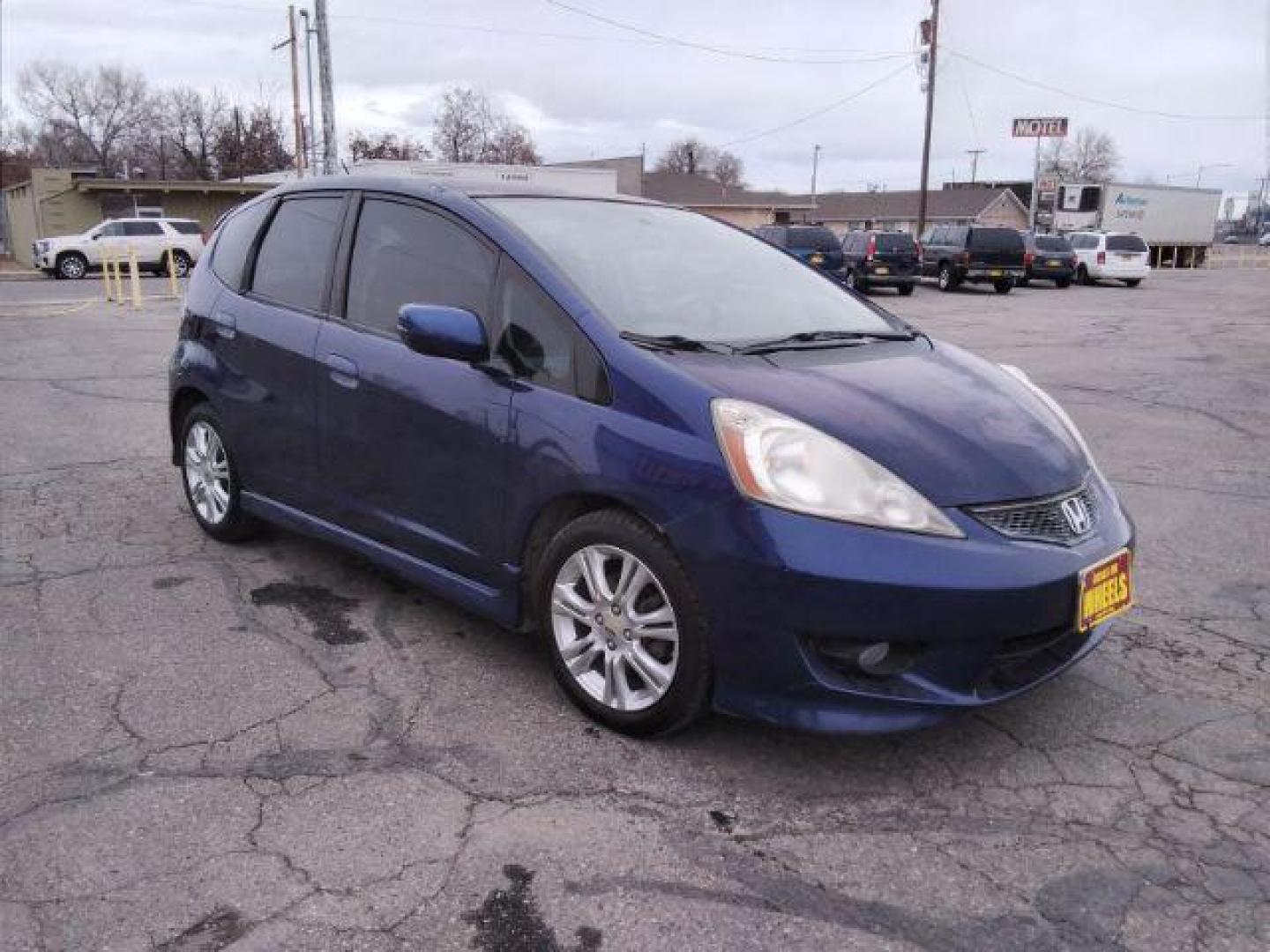 2009 Honda Fit Sport 5-Speed MT (JHMGE87409S) with an 1.5L L4 SOHC 16V engine, 5-Speed Manual transmission, located at 4047 Montana Ave., Billings, MT, 59101, 45.770847, -108.529800 - Photo#5