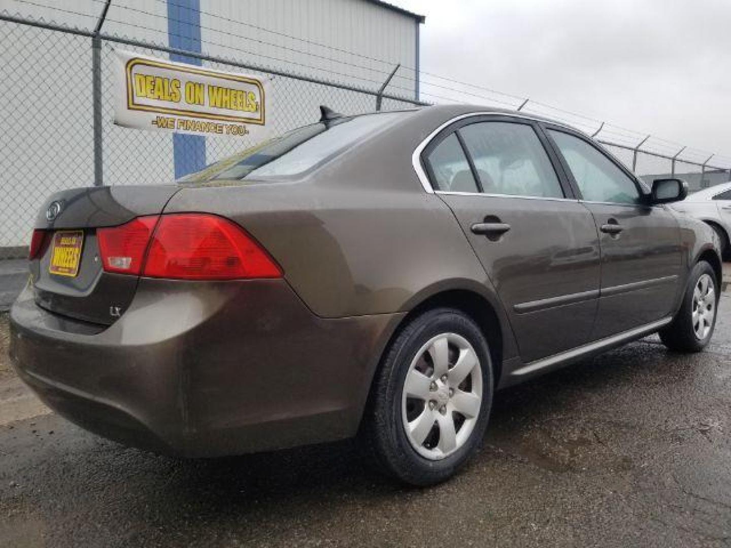 2009 Kia Optima EX (KNAGE228795) with an 2.4L L4 DOHC 16V engine, 4-Speed Automatic transmission, located at 1800 West Broadway, Missoula, 59808, (406) 543-1986, 46.881348, -114.023628 - Photo#11