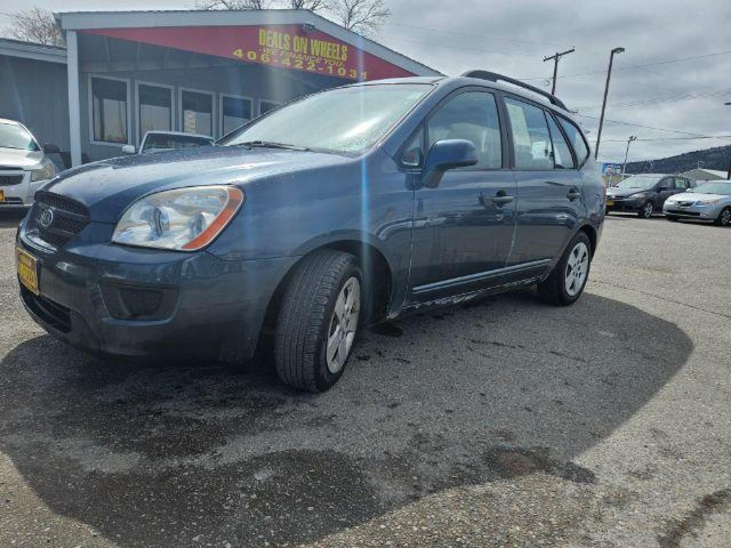 2009 Kia Rondo LX (KNAFG529097) with an 2.4L L4 DOHC 16V engine, 4-Speed Automatic transmission, located at 1821 N Montana Ave., Helena, MT, 59601, 0.000000, 0.000000 - Photo#0