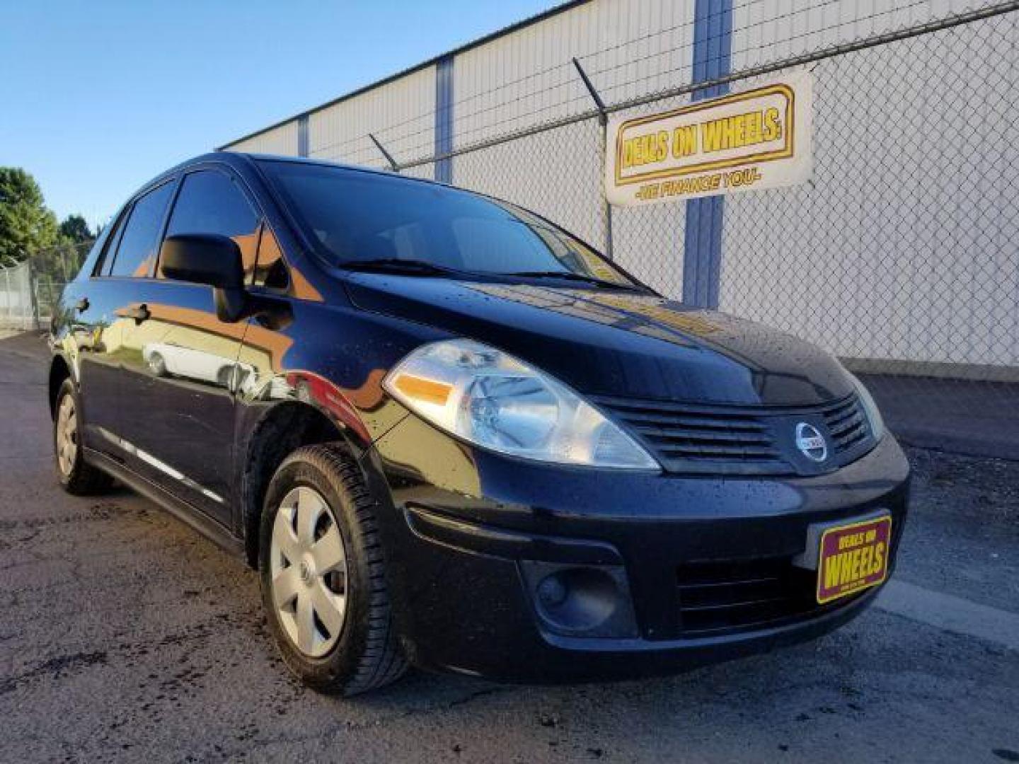 2009 Nissan Versa 1.6 Base Sedan (3N1CC11E79L) with an 1.6L L4 DOHC 16V engine, 5-Speed Manual transmission, located at 601 E. Idaho St., Kalispell, MT, 59901, (406) 300-4664, 0.000000, 0.000000 - Photo#6