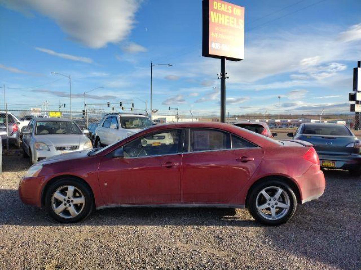 2009 Performance Red Tintcoat Pontiac G6 GT Sedan (1G2ZH57N294) with an 3.5L V6 OHV 12V engine, 4-Speed Automatic transmission, located at 4801 10th Ave S,, Great Falls, MT, 59405, 0.000000, 0.000000 - Photo#1