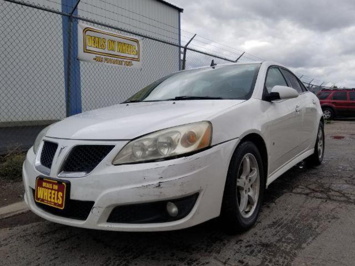 2009 Pontiac G6 Sedan (1G2ZJ57K694) with an 3.5L V6 OHV 12V engine, 4-Speed Automatic transmission, located at 601 E. Idaho St., Kalispell, MT, 59901, (406) 300-4664, 0.000000, 0.000000 - Photo#0