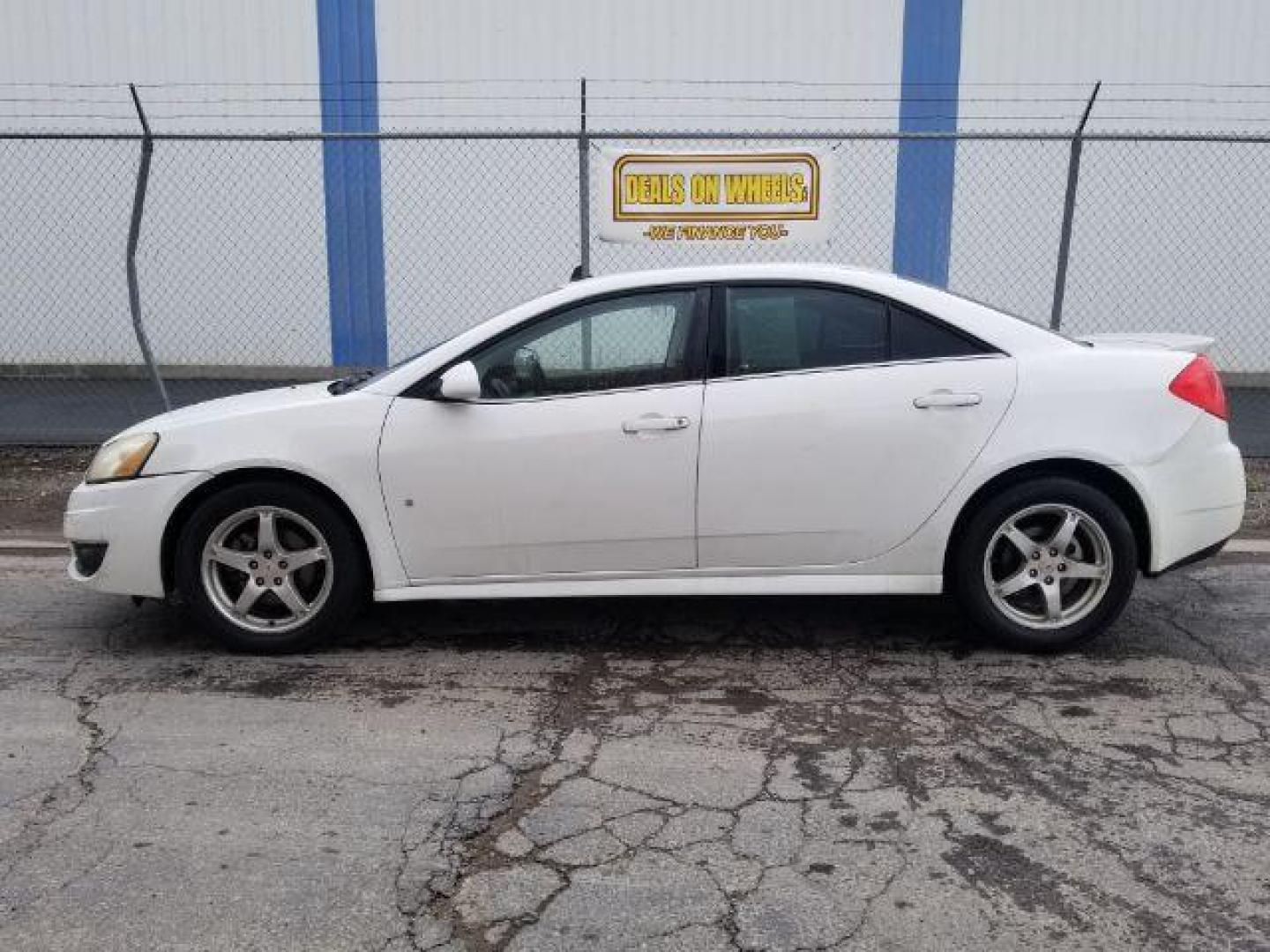 2009 Pontiac G6 Sedan (1G2ZJ57K694) with an 3.5L V6 OHV 12V engine, 4-Speed Automatic transmission, located at 601 E. Idaho St., Kalispell, MT, 59901, (406) 300-4664, 0.000000, 0.000000 - Photo#2