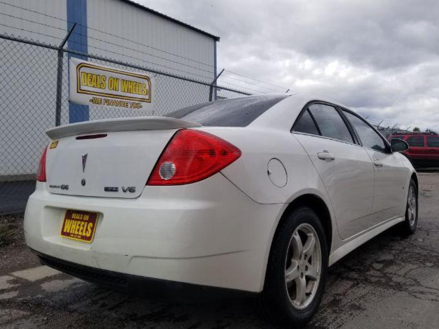 2009 Pontiac G6 Sedan (1G2ZJ57K694) with an 3.5L V6 OHV 12V engine, 4-Speed Automatic transmission, located at 601 E. Idaho St., Kalispell, MT, 59901, (406) 300-4664, 0.000000, 0.000000 - Photo#4