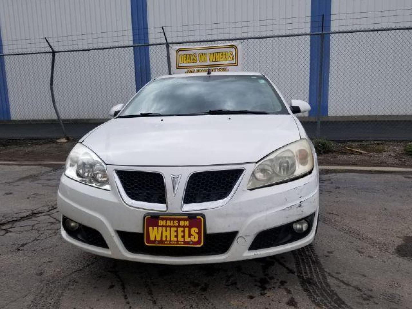 2009 Pontiac G6 Sedan (1G2ZJ57K694) with an 3.5L V6 OHV 12V engine, 4-Speed Automatic transmission, located at 601 E. Idaho St., Kalispell, MT, 59901, (406) 300-4664, 0.000000, 0.000000 - Photo#1