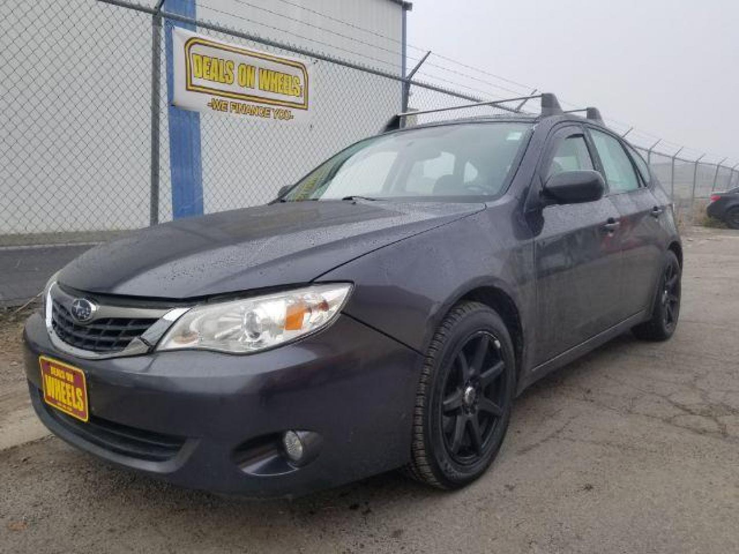 2009 Subaru Impreza 2.5i Premium 5-Door (JF1GH60679H) with an 2.5L H4 SOHC 16V engine, located at 601 E. Idaho St., Kalispell, MT, 59901, (406) 300-4664, 0.000000, 0.000000 - Photo#0