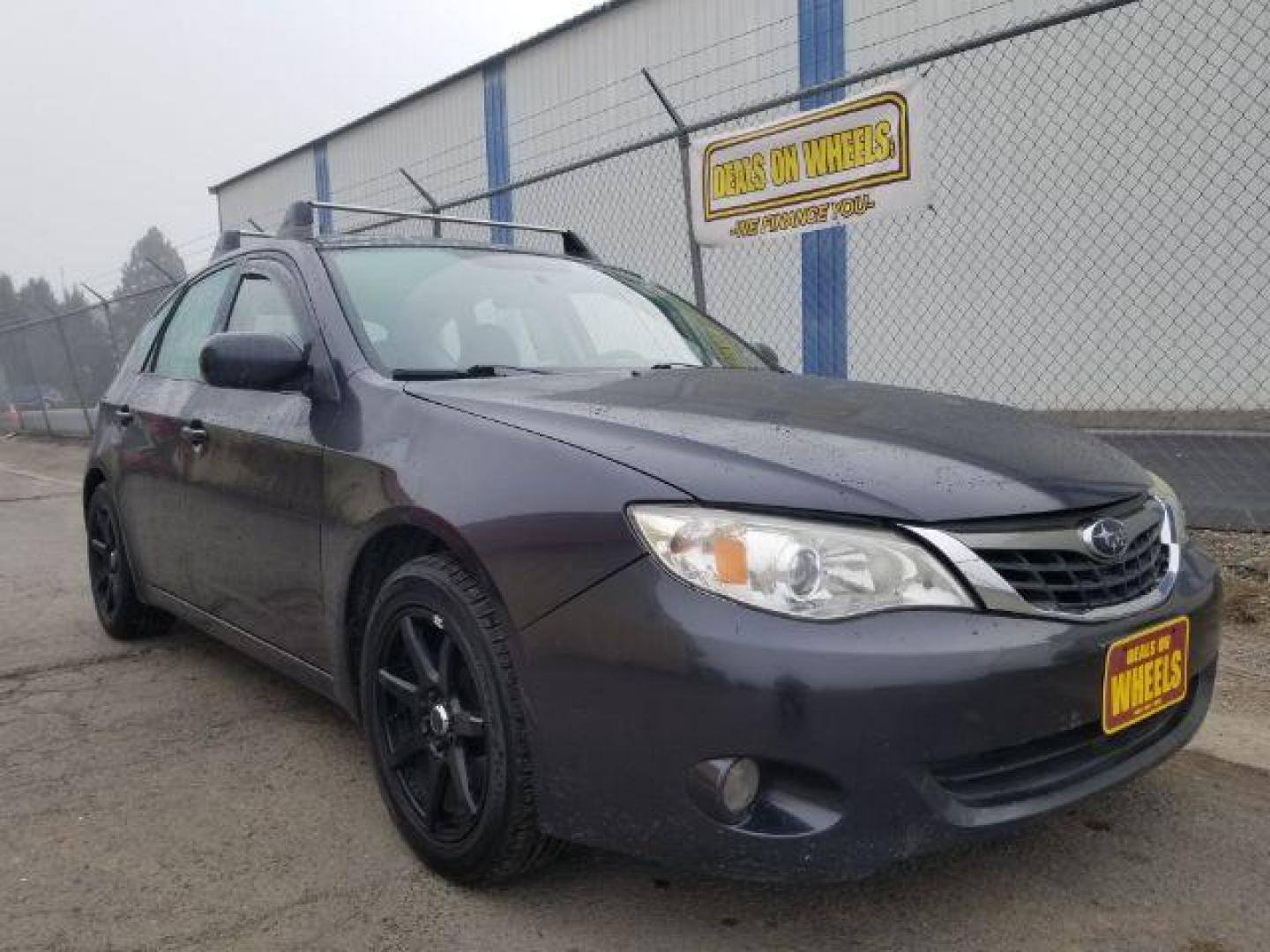 2009 Subaru Impreza 2.5i Premium 5-Door (JF1GH60679H) with an 2.5L H4 SOHC 16V engine, located at 601 E. Idaho St., Kalispell, MT, 59901, (406) 300-4664, 0.000000, 0.000000 - Photo#2