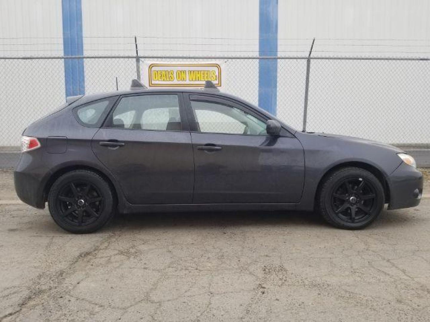 2009 Subaru Impreza 2.5i Premium 5-Door (JF1GH60679H) with an 2.5L H4 SOHC 16V engine, located at 601 E. Idaho St., Kalispell, MT, 59901, (406) 300-4664, 0.000000, 0.000000 - Photo#3