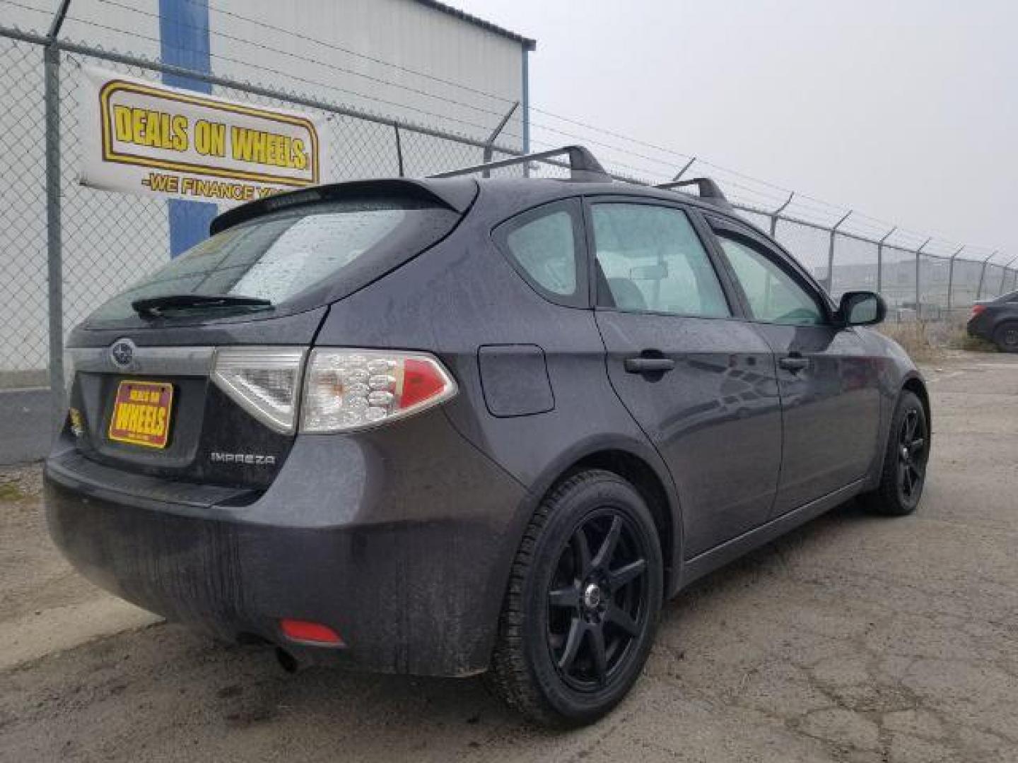 2009 Subaru Impreza 2.5i Premium 5-Door (JF1GH60679H) with an 2.5L H4 SOHC 16V engine, located at 601 E. Idaho St., Kalispell, MT, 59901, (406) 300-4664, 0.000000, 0.000000 - Photo#4