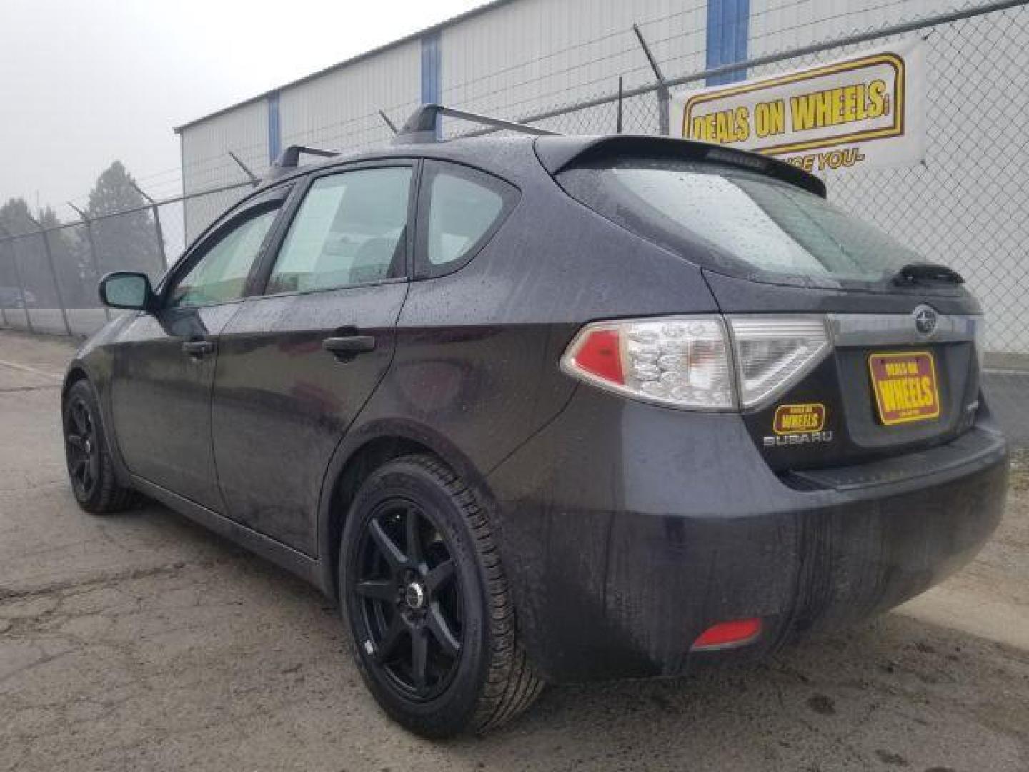 2009 Subaru Impreza 2.5i Premium 5-Door (JF1GH60679H) with an 2.5L H4 SOHC 16V engine, located at 601 E. Idaho St., Kalispell, MT, 59901, (406) 300-4664, 0.000000, 0.000000 - Photo#5