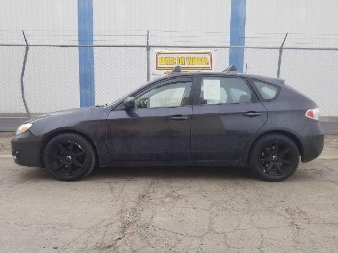 2009 Subaru Impreza 2.5i Premium 5-Door (JF1GH60679H) with an 2.5L H4 SOHC 16V engine, located at 601 E. Idaho St., Kalispell, MT, 59901, (406) 300-4664, 0.000000, 0.000000 - Photo#6