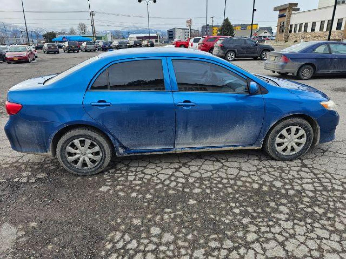 2009 Toyota Corolla LE 4-Speed AT (JTDBL40E59J) with an 1.8L L4 DOHC 16V engine, 4-Speed Automatic transmission, located at 1800 West Broadway, Missoula, 59808, (406) 543-1986, 46.881348, -114.023628 - Photo#4